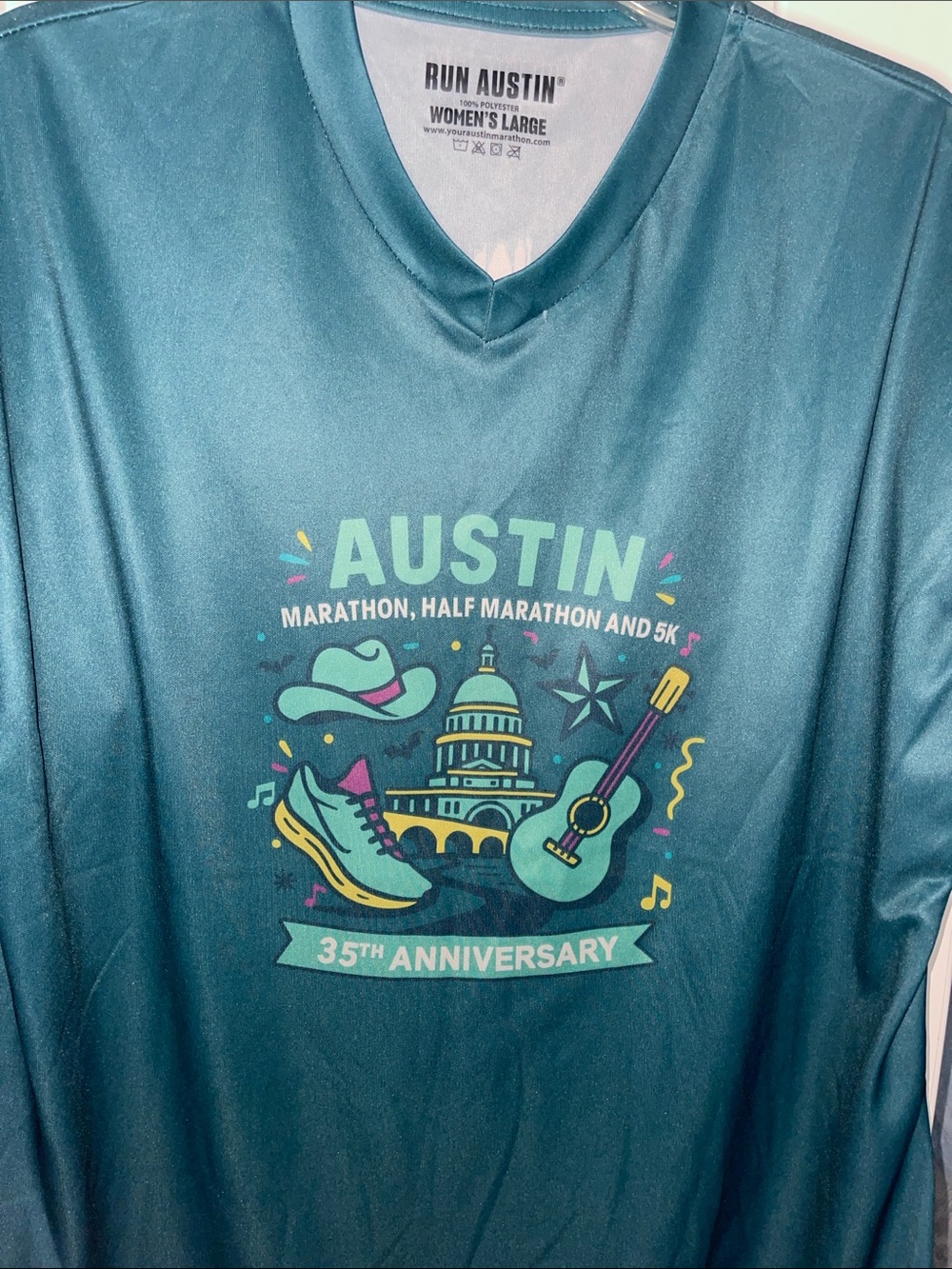 Austin 35th Anniversary Teal Women’s Short-Sleeve V-Neck Running Shirt